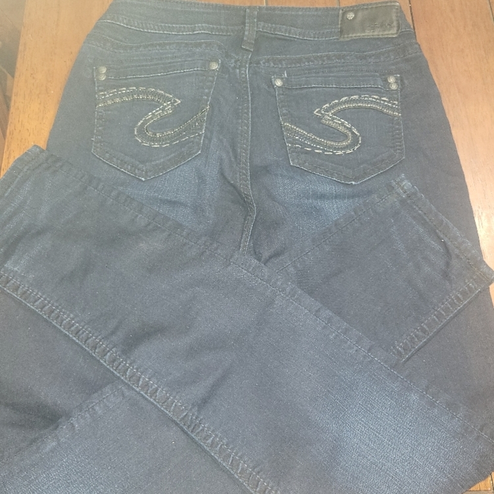 Womans dark wash skinny silver jeans